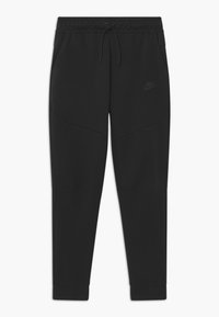 Pantaloni della tuta neri realizzati in morbido tessuto. Presentano una vita elasticizzata con cordino e tasche laterali. Logo discreto sulla coscia sinistra.