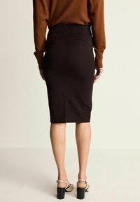 Next Kokerrok - black