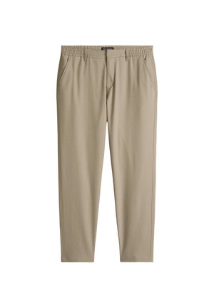 Pantaloni beige slim fit con vita elasticizzata, tasche laterali, passanti per cintura e chiusura frontale con zip, mostrati distesi su uno sfondo bianco.