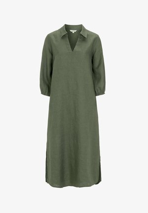 Robe en lin vert olive avec un décolleté en V, un col et des manches bouffantes trois-quarts. Présente des fentes latérales pour plus de liberté de mouvement.