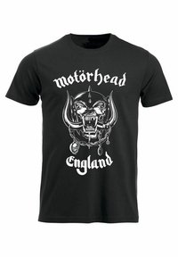 Sort bomulds T-shirt med et stort hvidt grafisk print af et kranium med horn og kæder, sammen med teksten "Motorhead" og "England."