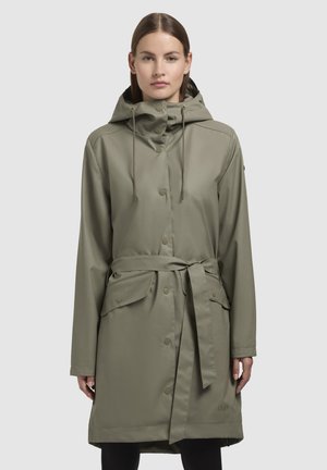 Olive green raincoat, lightweight, with a cinched waist, hood, snap buttons, and side pockets. Smooth texture with an adjustable drawstring.