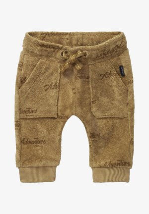 Bruine badstof peuterbroek met voorzakken, trekkoord in de taille, geribde boorden en een subtiel tekstpatroon over de hele stof.