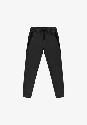 Zwarte joggers gemaakt van zachte stof met een taps toelopend ontwerp, elastische tailleband en twee zijzakken met rits. Gladde textuur met geribbelde manchetten.