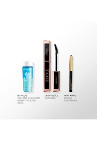 Lancôme Bi-Facil Augenreiniger in einer blauen Flasche, Lash Idôle Mascara in einer rosa und schwarzen Tube und ein Mini Khôl schwarzer Kajalstift mit goldenen Akzenten.
