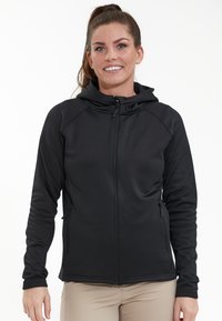 Zwarte zip-up hoodie met hoge kraag, lange mouwen en twee zijzakken. Heeft een gladde textuur en een aansluitend ontwerp.