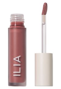 Matte lip color in a transparent tube with a frosted brown tone. Includes a clear applicator wand with a textured tip.