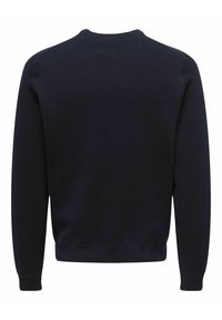 Suéter de punto azul marino con un sencillo escote redondo, tejido texturizado y puños y dobladillo acanalados, que presenta un diseño de espalda sin costuras.