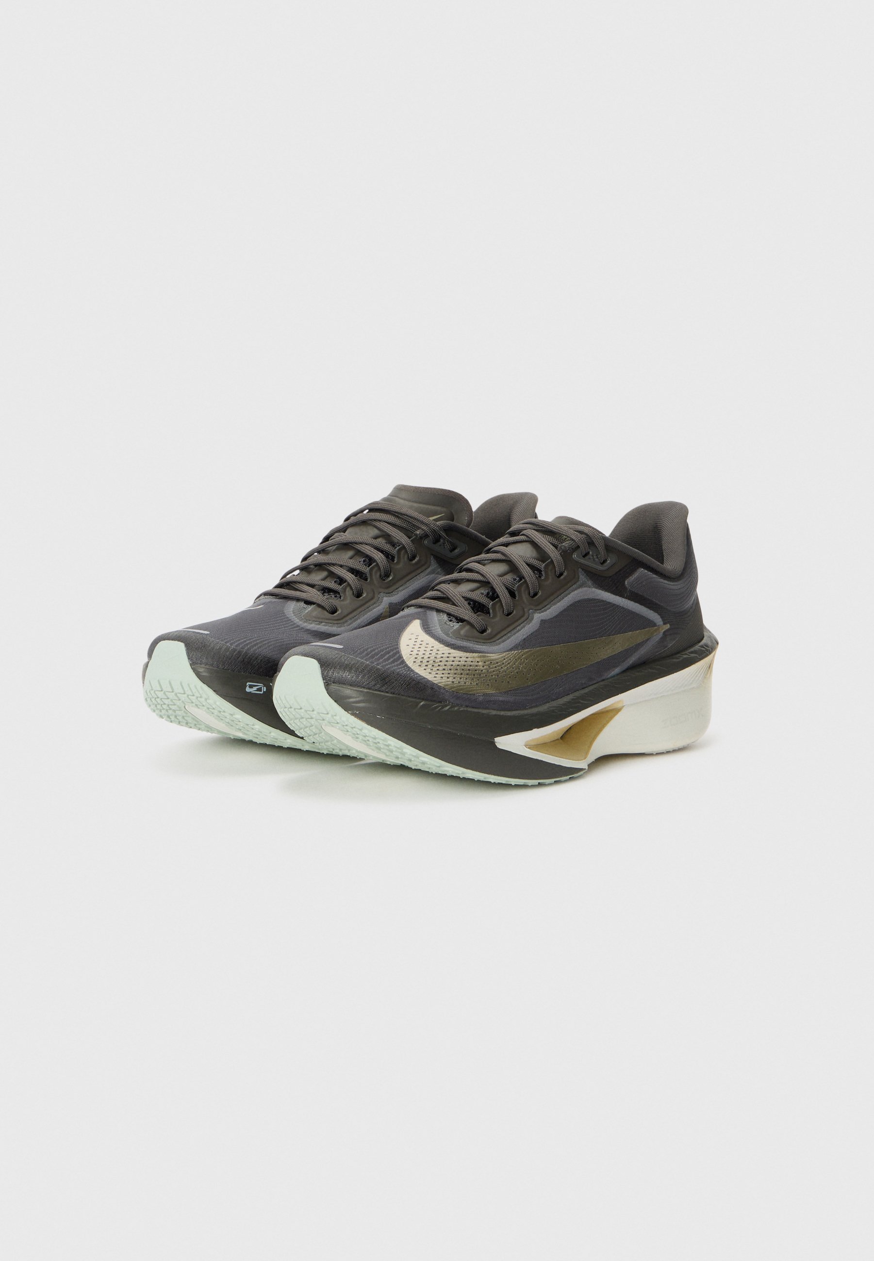 Nike Performance ZOOM FLY JAKOB - Road running shoes - ash/gold-coloured  grain/summit white/silver-coloured/black/vast grey/black - Zalando.co.uk