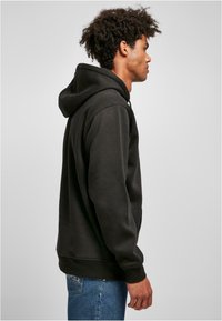 Southpole SPRAY - Kapucnis pulóver - black