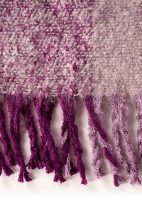 Purple fringed scarf with a textured woven pattern, featuring varying shades of purple and soft fuzzy fibers. Fringes are twisted and tapered.