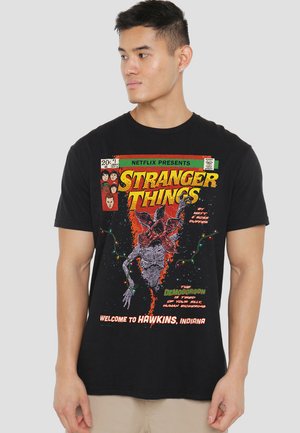 STRANGER THINGS WELCOME TO HAWKINS COMICS - Print T-shirt - black