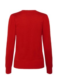 Pull en tricot rouge avec des manches longues, un col rond, des bords ribber et une texture lisse. Pas de motifs ni de matériel visible.
