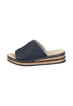 Navy blue open-toe slide sandal with beige cushioned footbed and layered cork sole featuring black trim and white stitching.