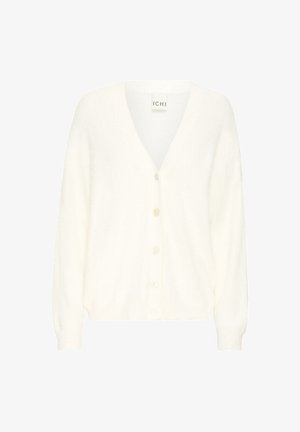 Balta, pūkuota kardiganas su V formos iškirpte, ilgomis rankovėmis ir penkių mygtukų uždarymu. Minkšta tekstūra ir laisvas siluetas. Matomas prekės ženklas.