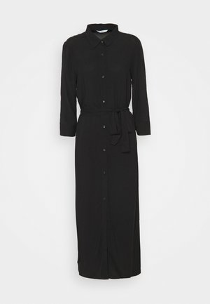 Vestido negro de manga larga con botones, cuello y cinturón para atar en la cintura, de largo midi, mostrado sobre un fondo claro y liso.