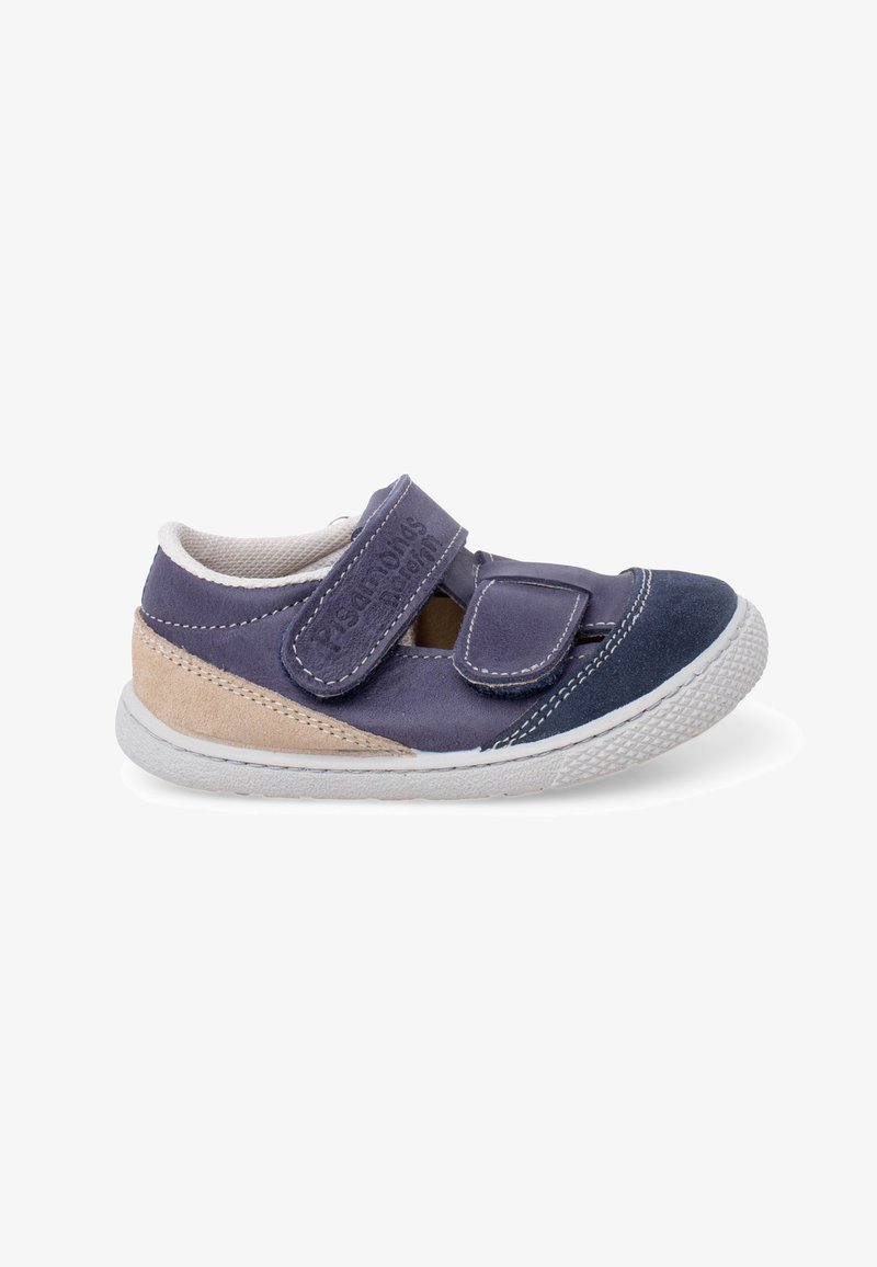 Baskets pour enfants bleu marine et beige avec des scratchs et une semelle en caoutchouc blanche, vue latérale sur fond blanc.