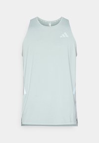 Šviesiai žalia, be rankovių sportinė palaidinė su apvalia apykakle, šoninėmis skeltukėmis ir baltais logotipo akcentais priekyje. Lygios audinio tekstūros.