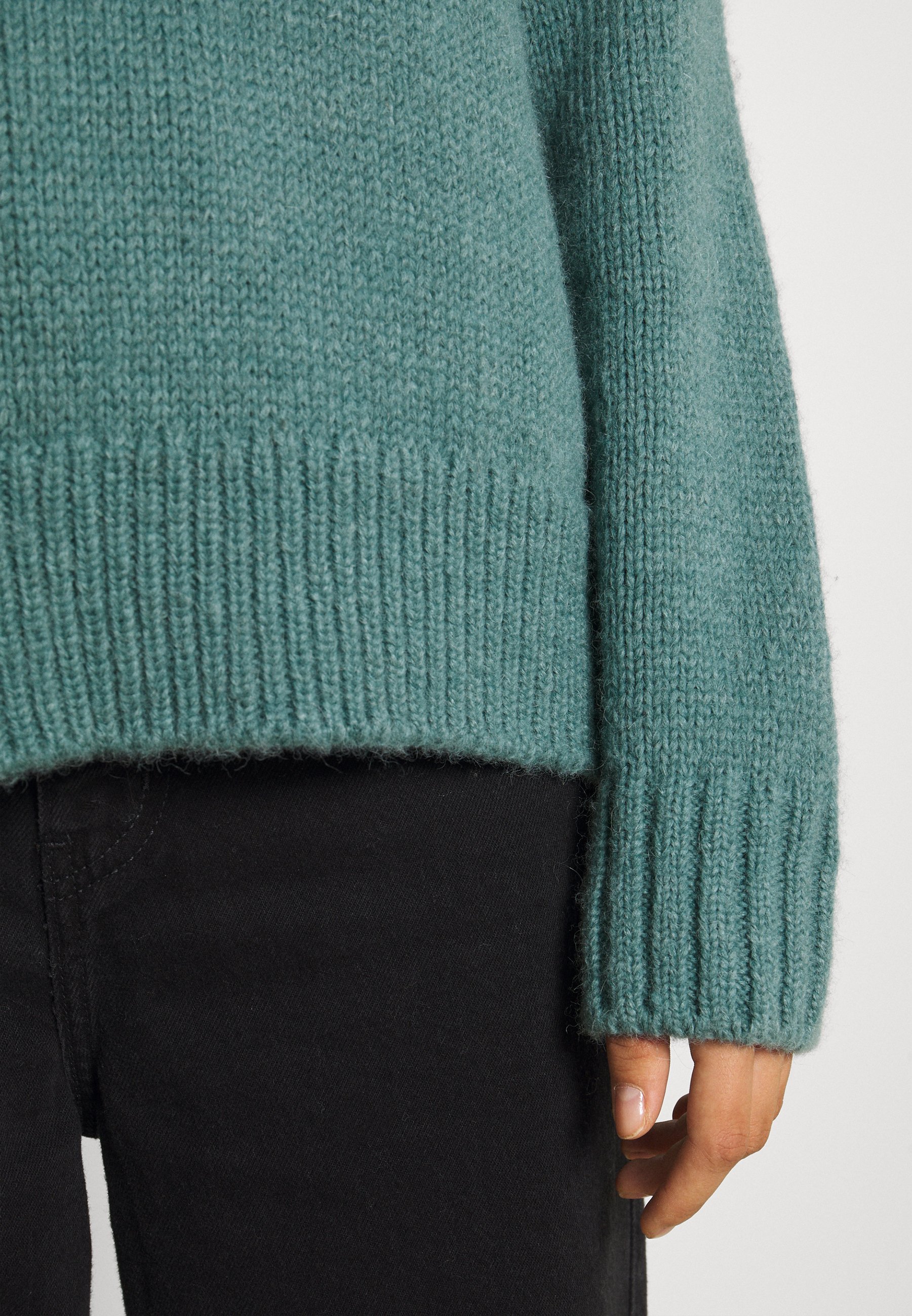 teal jumper womens
