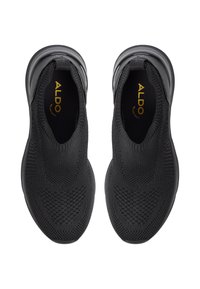 Black knit sneakers with a textured surface, elastic cuff, and logo on the midsole. Lightweight design and flexible sole for comfort.