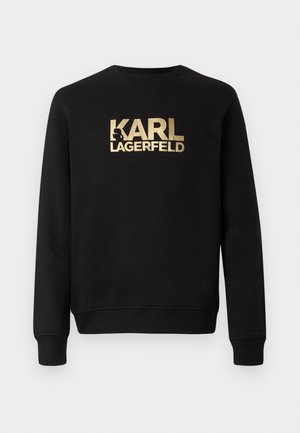 Svart hettegenser med rund hals og lange ermer. Har en fremtredende gull-logo tekst "KARL LAGERFELD" på foran. Glatt tekstur.