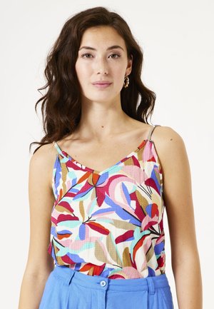 Multikleurig mouwloos top met een V-hals ontwerp. Bevat een bloemenpatroon in rood, blauw en roze op een lichte achtergrond. Lichte stof.