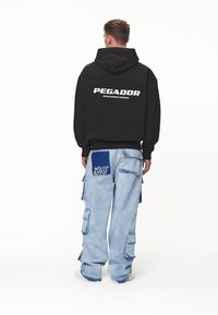 Pegador COLNE LOGO JACKET - Cipzáras pulóver - black