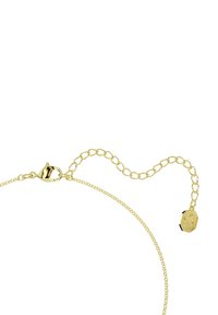 Złocony naszyjnik z delikatnym łańcuszkiem, zatrzaskiem typu lobster oraz ośmiokątnym zawieszką z wygrawerowanymi detalami.