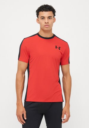Red athletic t-shirt with black side panels, round neckline, short sleeves, and logo on the chest. Made from a lightweight, moisture-wicking material.