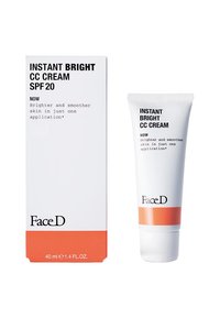 Crema CC istantanea Bright SPF 20 in un tubetto bianco con accenti arancioni, affiancata da una scatola bianca e arancione, entrambe con etichette testuali ben visibili.