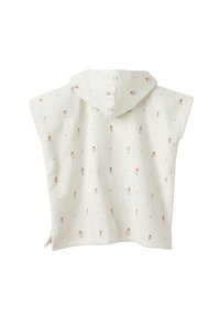 White hooded poncho with floral pattern in orange and green. Made of soft, textured fabric with side slits for ease of movement.