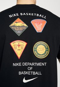 Nike Performance T-shirt imprimé - black