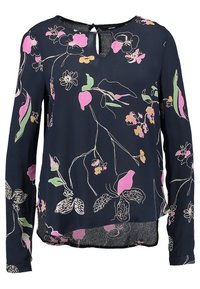 Granatowa bluzka z długim rękawem z kwiatowym wzorem w kolorach różowym, zielonym i żółtym. Posiada dekolt z wycięciem typu keyhole oraz luźny krój z zakrzywionym dołem.