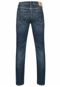 Tmavě modré džíny z denimu, úzký střih, pět kapes a kožená záplata na pase. Výrazné šití na zadních kapsách.