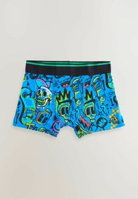 Boxer shorts blu con una stampa grafica di teschi, skateboard e colori vivaci. Vita nera con strisce verdi. Materiale in cotone.