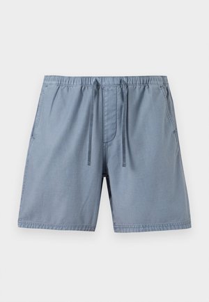 Light blue swim shorts featuring an elastic waistband with drawstring, side pockets, and a smooth textured fabric.