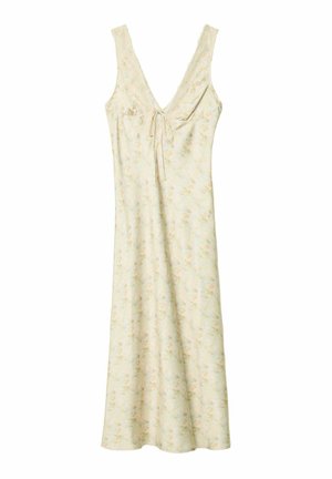 Nuisette légère à motif floral de couleur jaune pâle avec un décolleté en V, dentelle et lien ajustable au niveau de la poitrine. Tissu fluide et doux avec des bretelles sans manches.