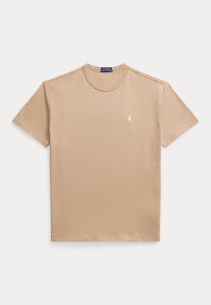 Bézs rövid ujjú, kerek nyakú póló, kis fehér Polo Ralph Lauren logóval a bal mellkason.