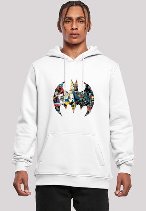 Hvid bomulds hoodie med et stort sort Batman-logo fyldt med farverige tegneseriepaneler. Den har en forlomma og hætte med snor.