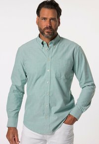 Hellgrünes, knopfbares Hemd aus weichem Stoff, mit einer Brusttasche, einem Button-Down-Kragen und langen Ärmeln mit Knopfmanschetten.