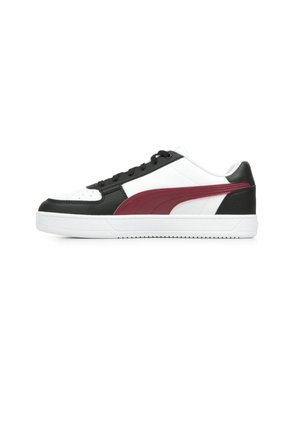 Adidași negri, albi și burgundy cu un superior din piele, talpă din cauciuc alb, vârf rotund și șase orificii pentru șireturi. Prezintă un logo pe lateral.