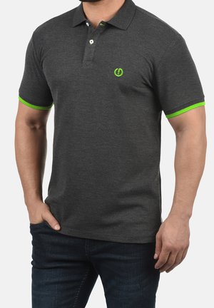 Dark gray polo shirt with short sleeves, featuring bright green accents on the collar and sleeve edges, and a logo on the left chest.