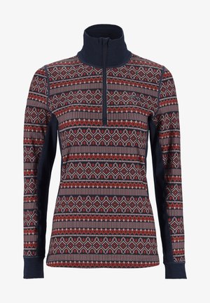 Langarm-Pullover mit einem halben Reißverschluss, der eine geometrische Vorderseite mit rotem und marineblauem Muster und einen einfarbigen, stretchy marineblauen Stoff an den Seiten und am Kragen aufweist.