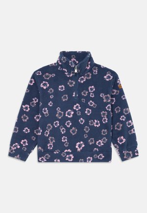 Pull en polaire marine avec des motifs floraux roses et gris foncé, col montant, demi-zip à l'avant et manches longues. Texturé doux avec des poignets élastiques.