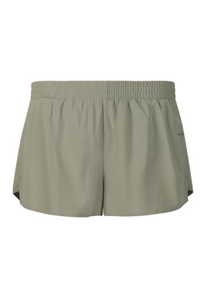 Lichtgroene sportshorts met elastische tailleband en zijsplitten, gemaakt van ademende stof.