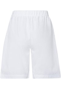 Shorts bianchi, lunghezza al ginocchio, realizzati in tessuto texturizzato. Presentano una vita elastica e un design semplice con gambe a taglio dritto.