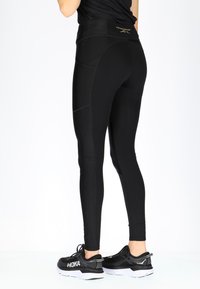 Swedemount PERFORMANCE TIGHTS W - Leggings - glossy black