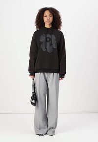 Marimekko SANOMA UNIKKO PLACEMENT HOODIE - Ikdienas džemperis - black