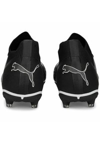 Puma Jalkapallokengät kiinteälle alustalle - black