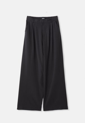 UNISEX - Hlače - black